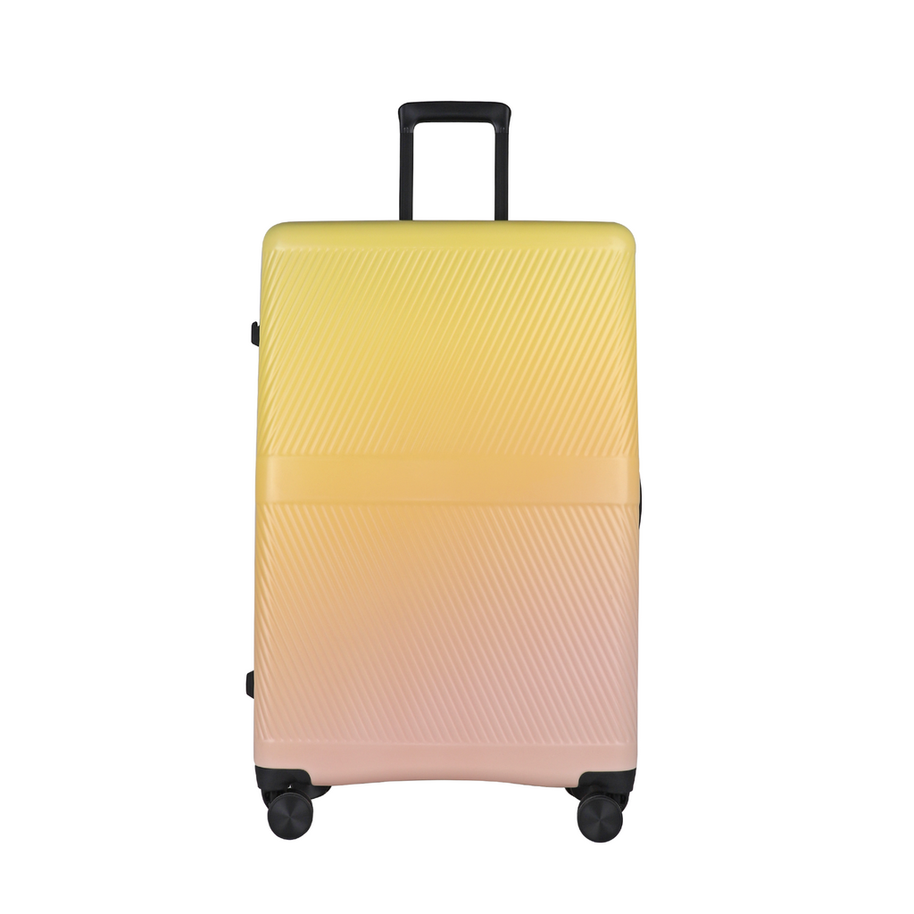 sunset yellow - Nature Gradient Lightweight Suitcase in the UK showcased against a scenic backdrop